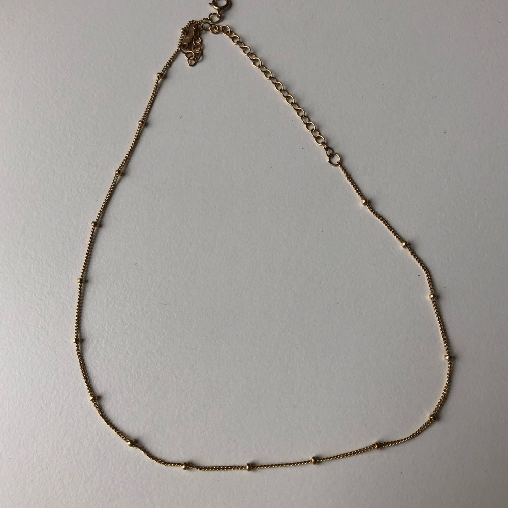 Dainty gold necklace with gold ball accents